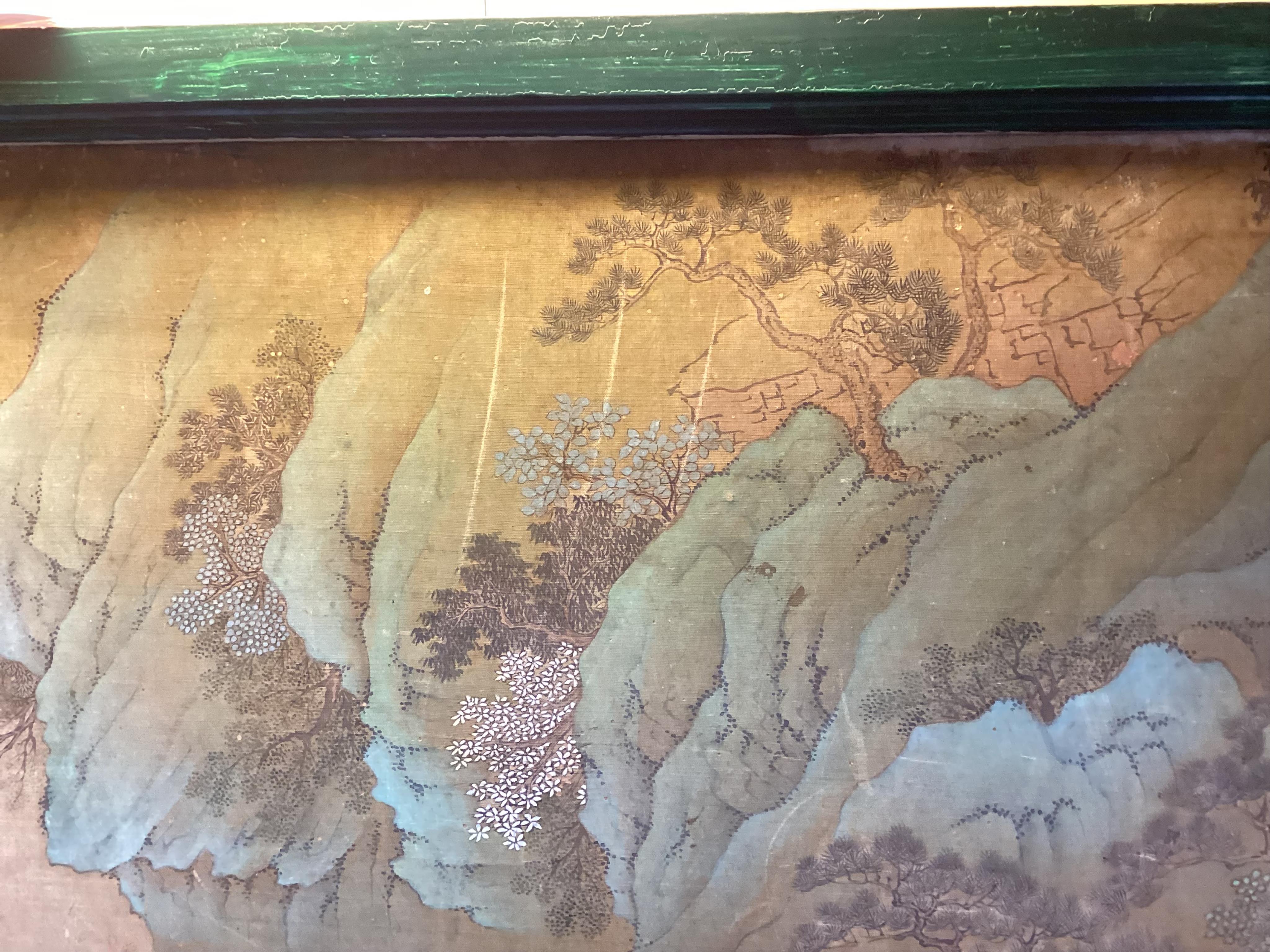 Chinese School , 17th century or earlier, Scholars in a mountainous river landscape scene with pavilions, Ink and colour on silk, incomplete clerical script signature, 54cm x 290cm